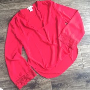 Beautiful pink blouse with lace on sleeve